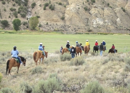 Photo: CHIP families horseback riding at Round Up River Ranch Family Camp